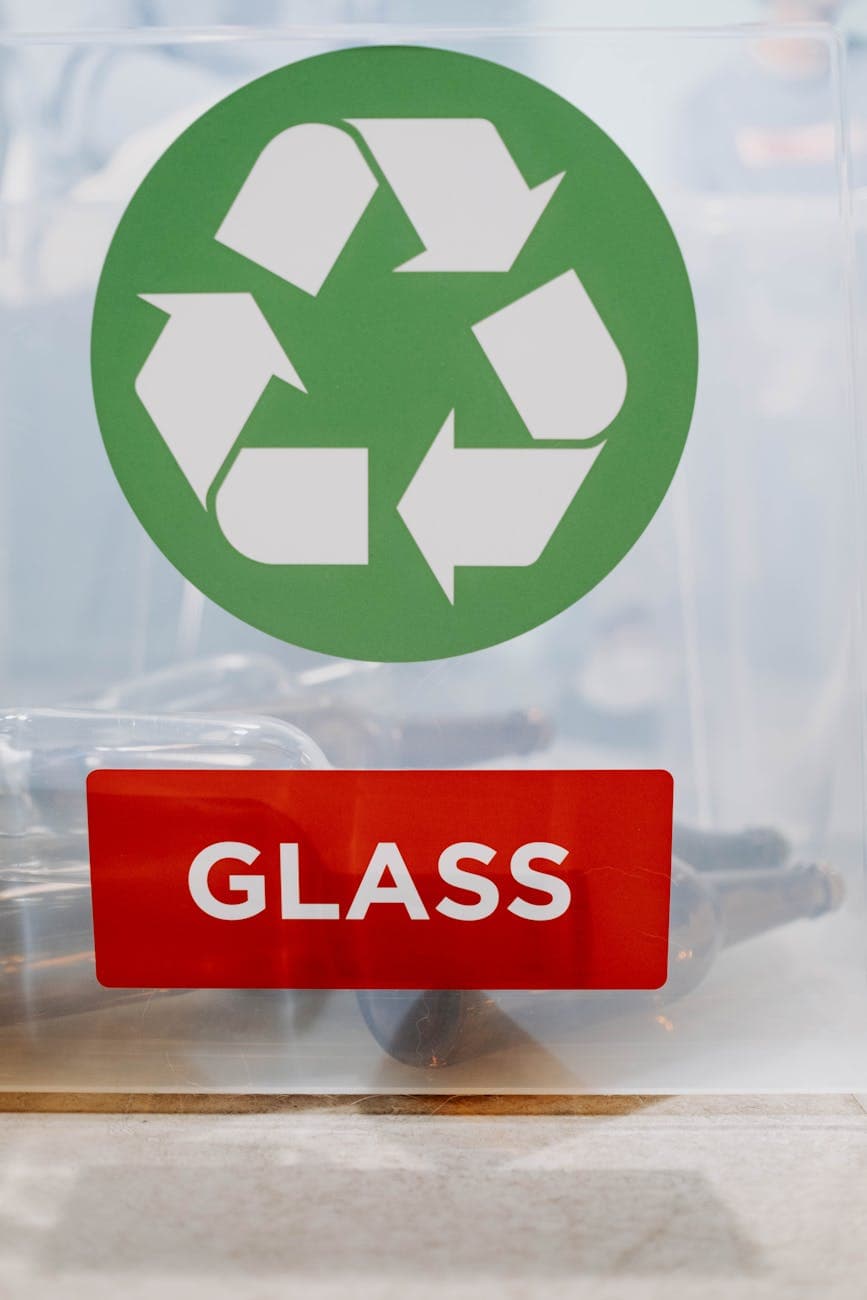 Recycling container with recycle symbol and eco certification label